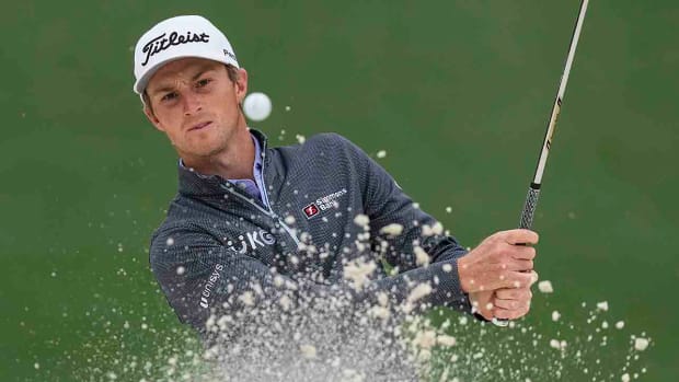 Will Zalatoris hits a shot from the bunker during practice for the 2023 Masters.